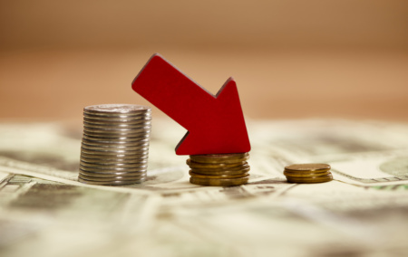 Selective Focus Of Decreasing Chart Made Of Coins 2026 03 12 23 50 10 Utc