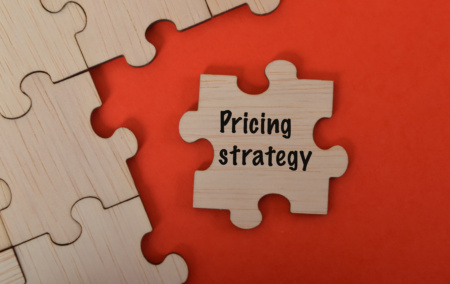 Pricing Strategy Puzzle Piece On Orange Background 2026 03 19 23 24 57 Utc